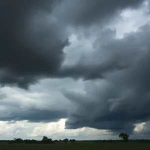 Stormy skies over Alabama with dark clouds indicating severe weather conditions.