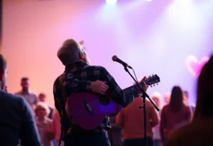 Cole Swindell performing during a tribute to Charlie Kirk