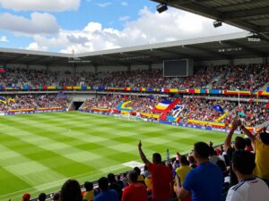 Excitement at Joe Davis Stadium during a college football game.