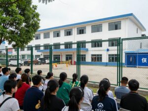 Community members discussing concerns about juvenile facility safety