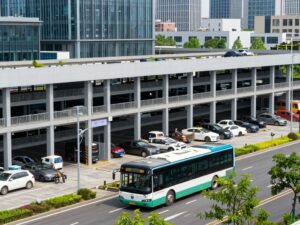 Modern parking garage and hybrid buses in Huntsville.