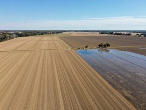 Aerial view showing contrast of dry fields and lush agricultural land in the Southeast to depict flash drought impact.
