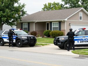 SWAT team conducting a raid in a suburban area of Huntsville