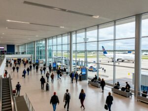 Passengers at Huntsville International Airport showcasing vibrant activity and modern infrastructure.